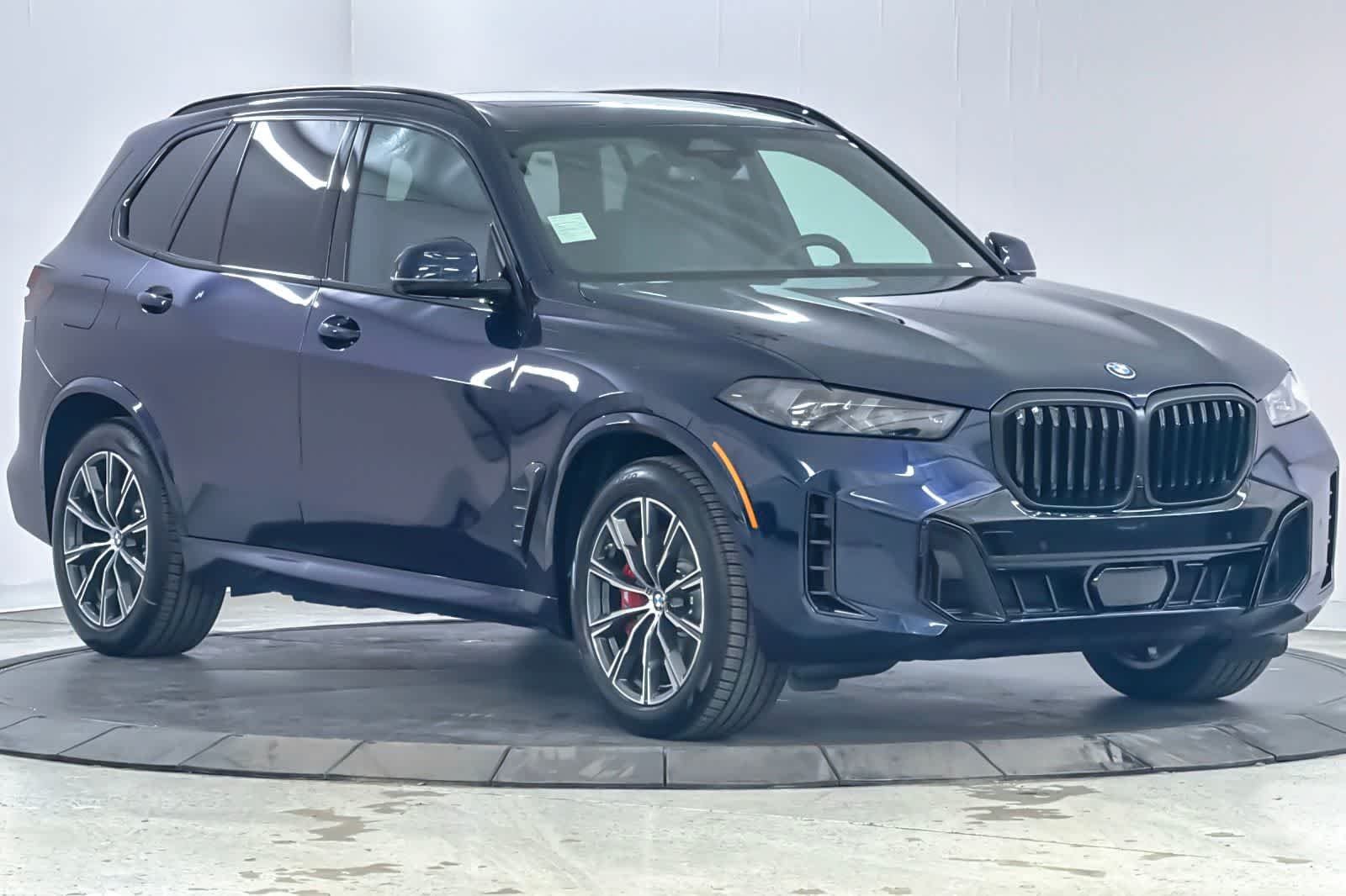 New 2026 Tanzanite Blue II Metallic BMW xDrive50e image 9