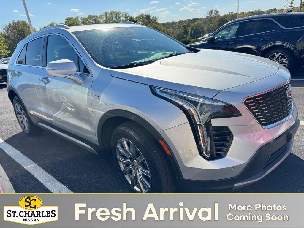 Used 2021 Red Cadillac Premium Luxury image 1