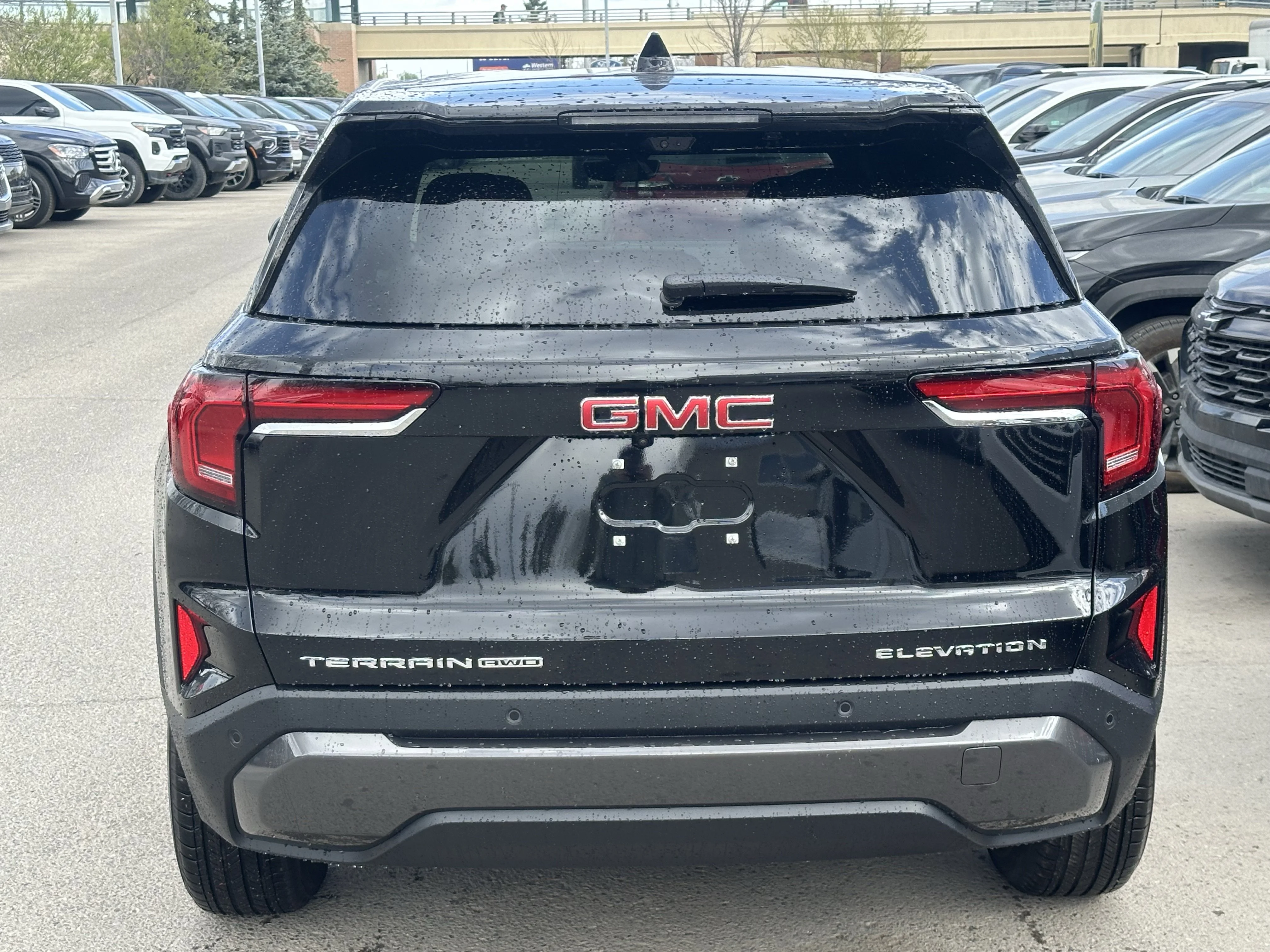 New 2026 Ebony Twilight Metallic GMC AWD Elevation image 5
