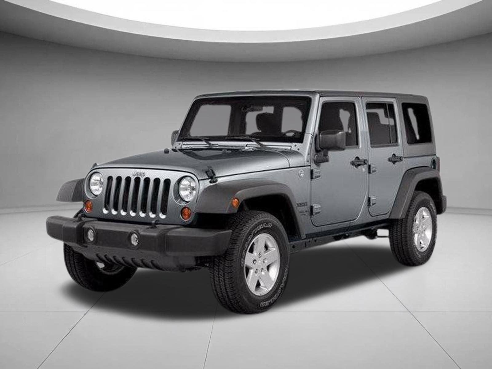 Used 2014 BRIGHT WHITE CLEARCOAT JEEP RUBI image 1