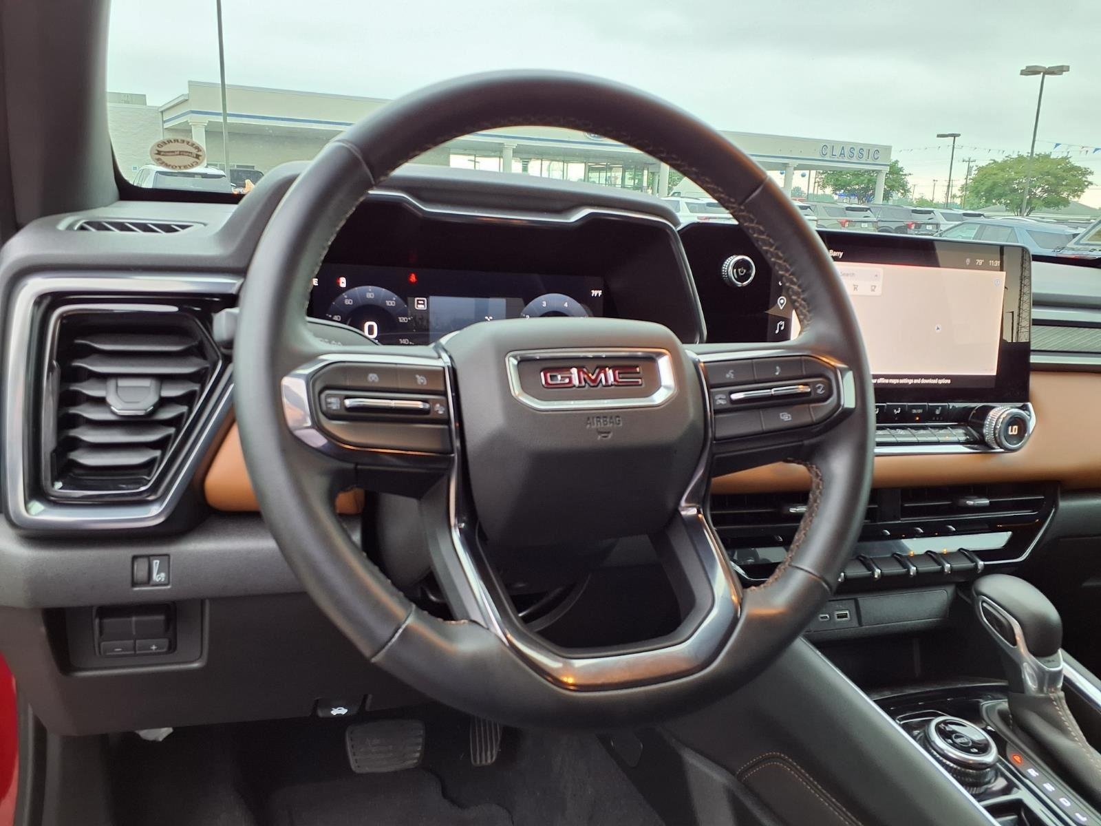 Used 2025 Volcanic Red Tintcoat GMC 4WD AT4 image 19