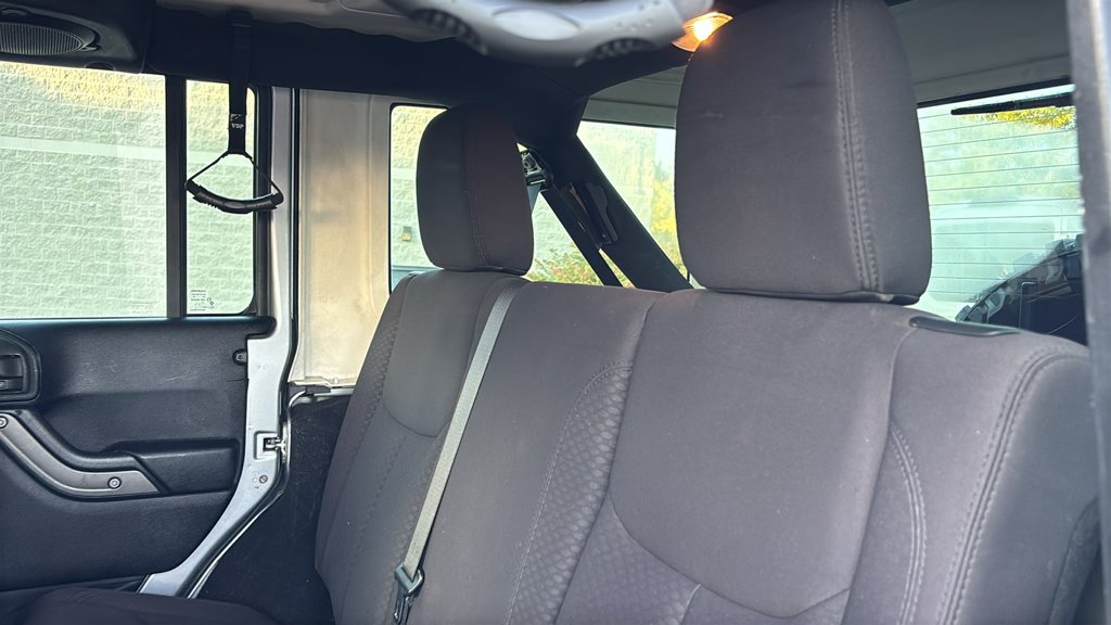 Used 2013 Billet Clearcoat Metallic Jeep Unlimited Sport image 20