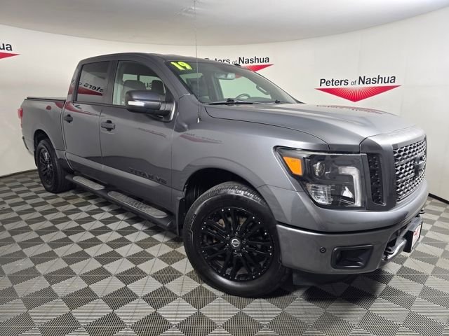 Used 2019 Gun Metallic Nissan SV image 1