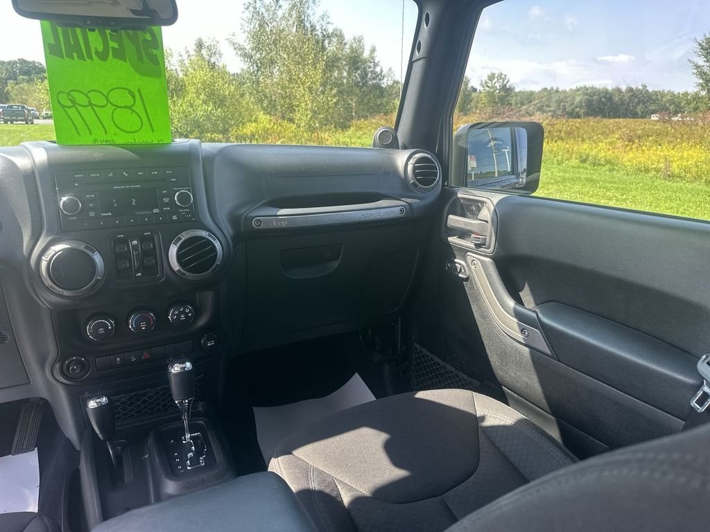 Used 2014 Black Jeep Unlimited Sport image 11