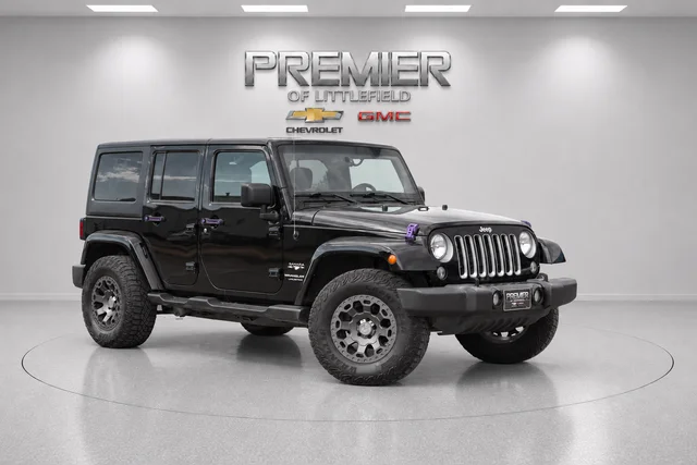 Used 2018 Black Jeep Unlimited Sahara image 1