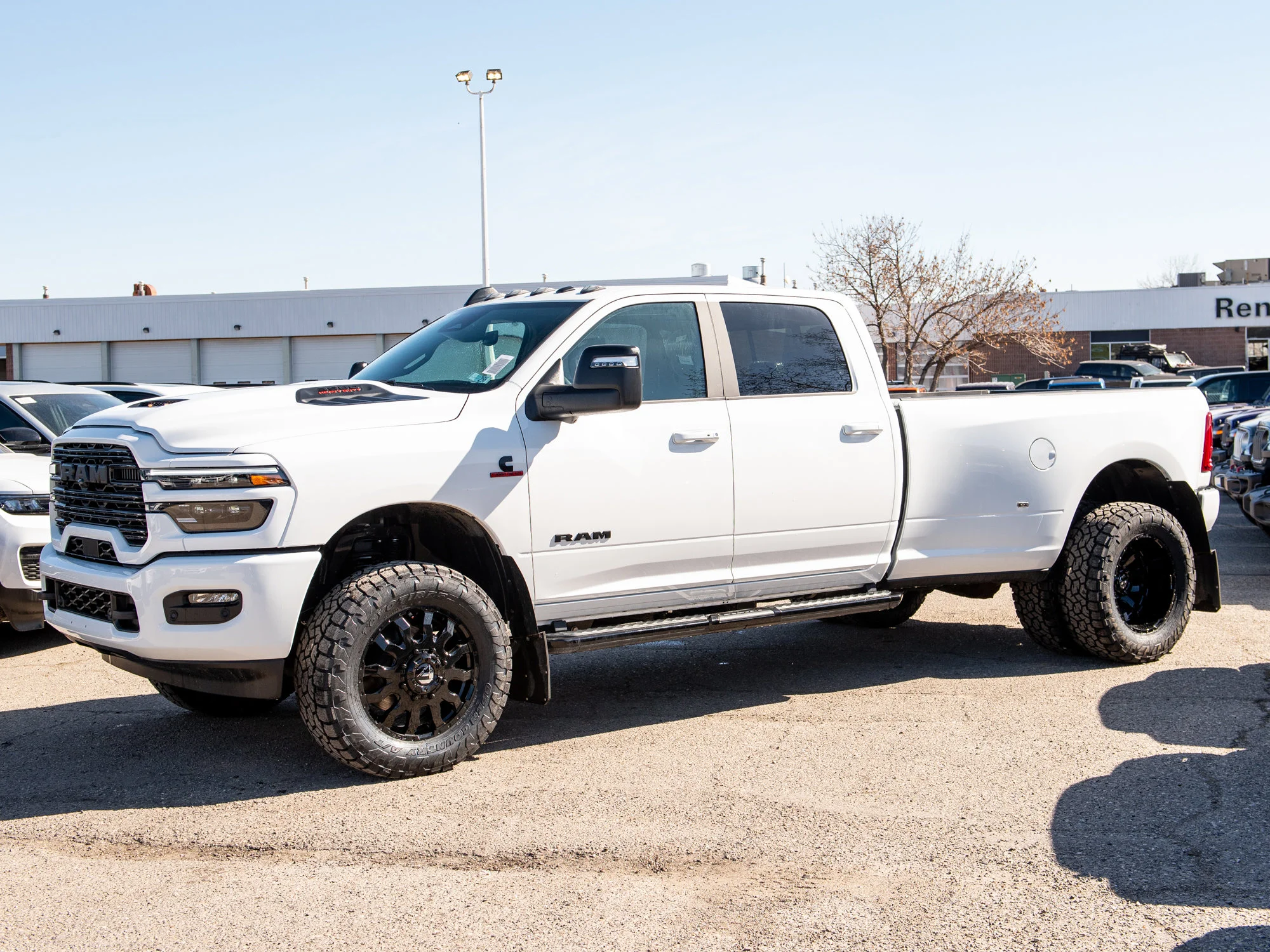 New 2026 White RAM Laramie* Dually, 8