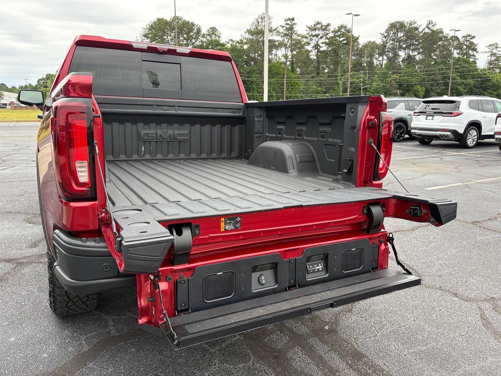 Used 2026 Volcanic Red Tintcoat GMC AT4X image 11