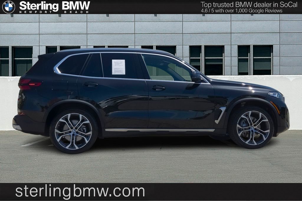 Used 2026 Black Sapphire Metallic BMW sDrive40i image 4
