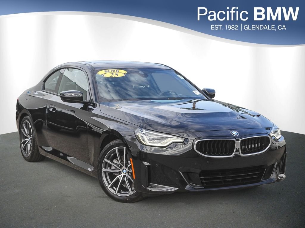 Used 2025 Black Sapphire Metallic BMW 230i image 1