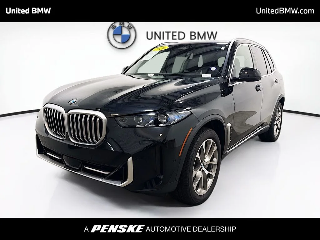 Certified Used 2026 Black Sapphire Metallic BMW sDrive40i image 1