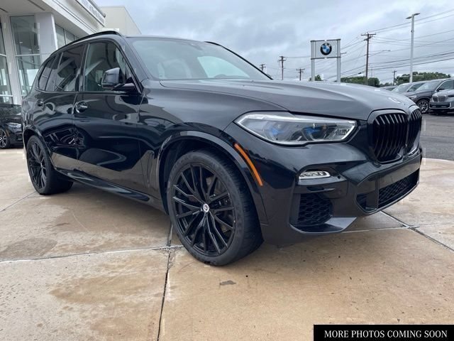 Used 2021 Black BMW xDrive40i image 1