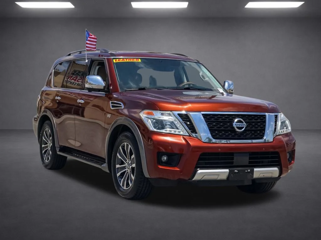 Used 2018 Brown Nissan SL image 1