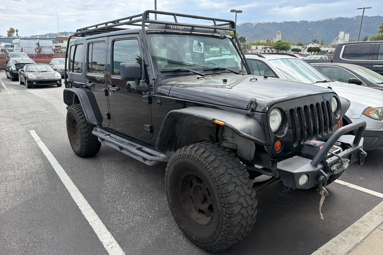 Used 2013 Black Jeep Unlimited Sport image 2