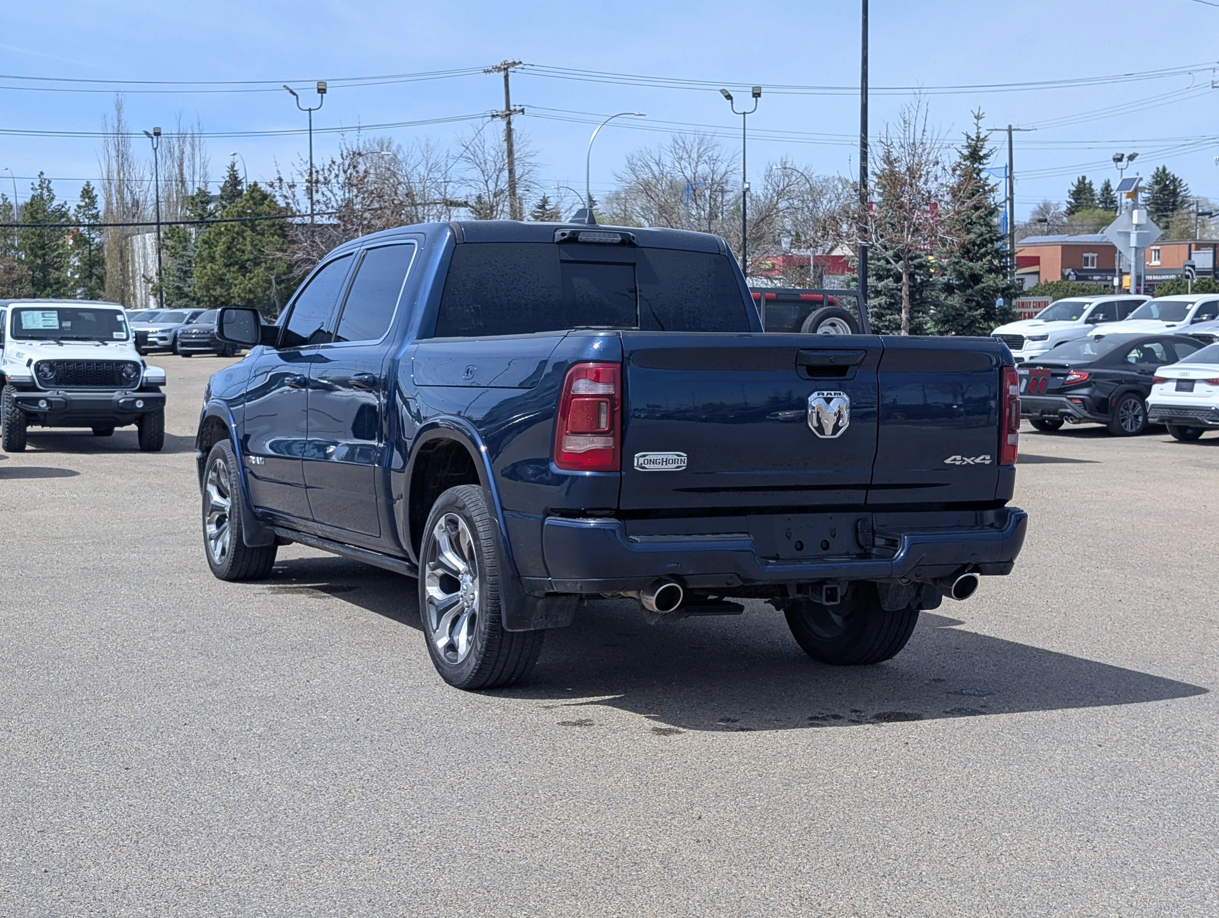 Used 2024 Patriot Blue Pearl Ram Limited Longhorn image 4