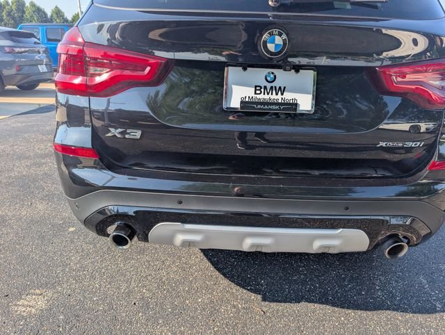 Used 2021 Black Sapphire Metallic BMW xDrive30i image 5
