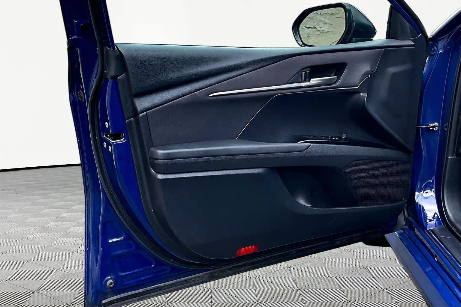 Used 2025 Reservoir Blue Toyota LE image 22