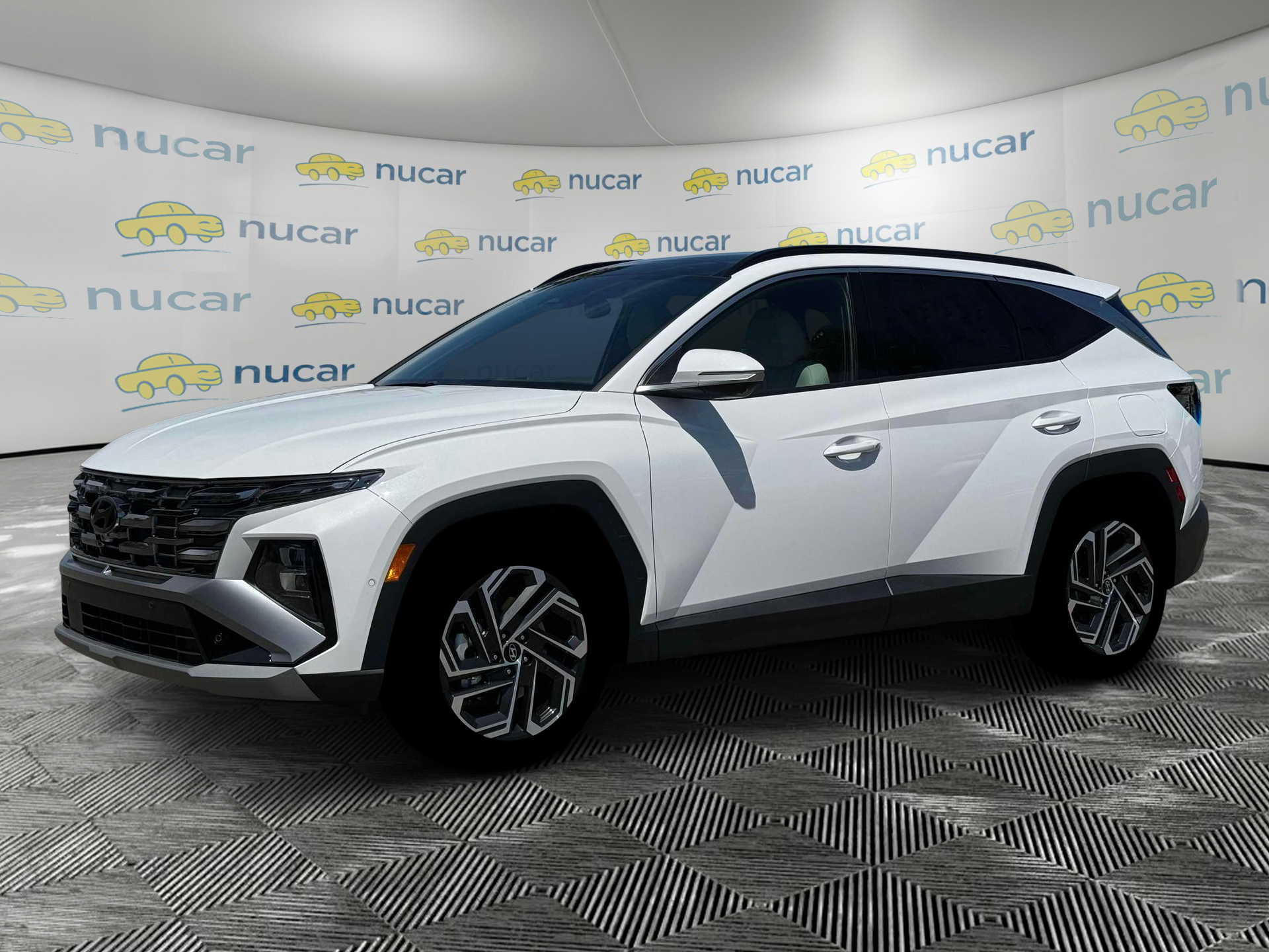 2026 Hyundai Tucson Limited in White at Nucar — photo 2