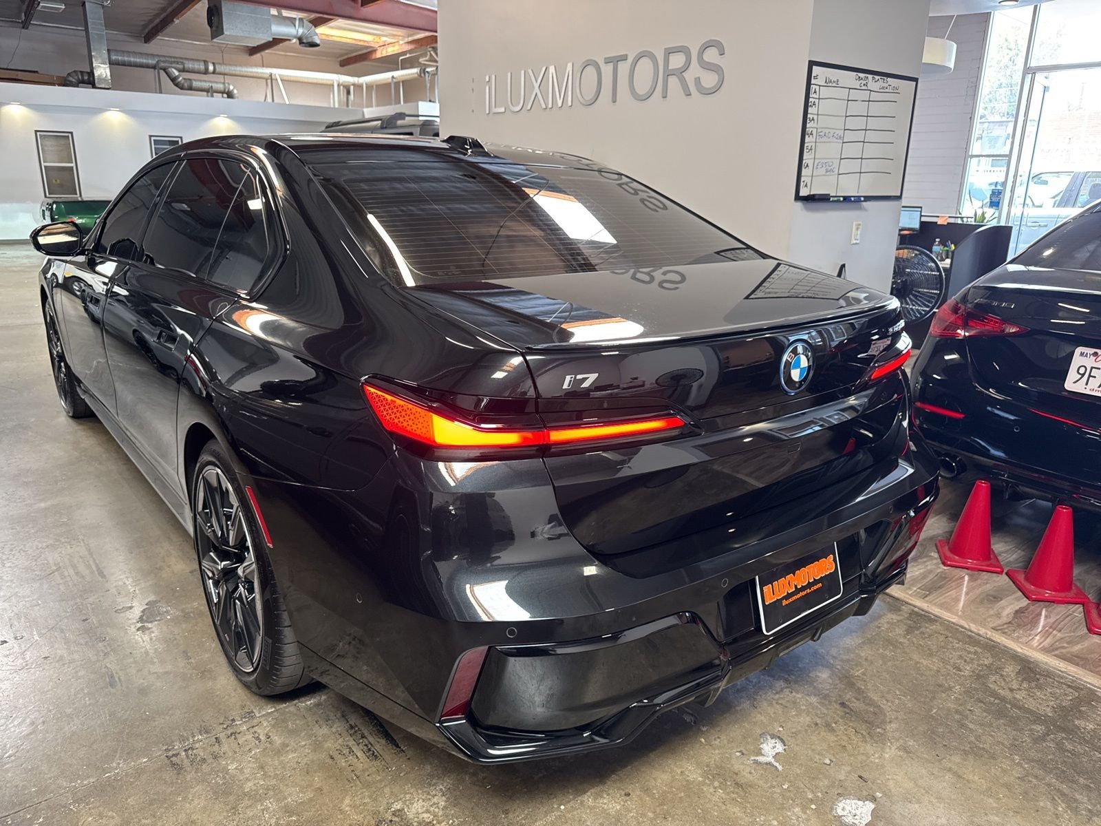 Used 2025 Black BMW xDrive60 image 20