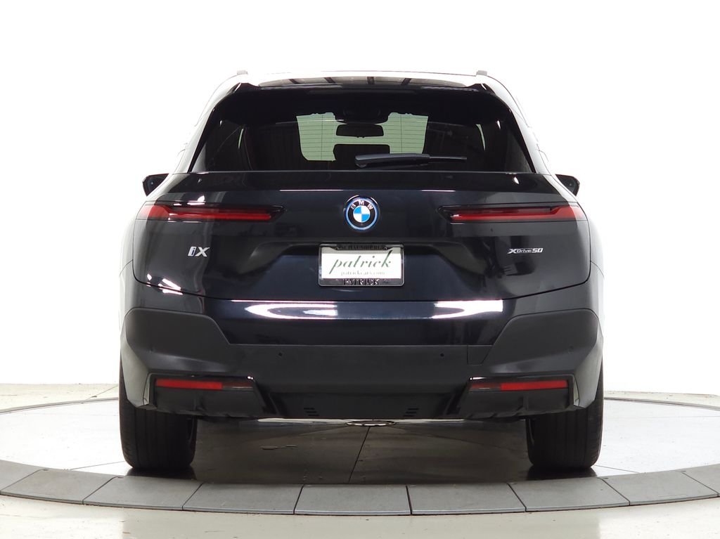 Used 2024 Black Sapphire Metallic BMW xDrive50 image 7