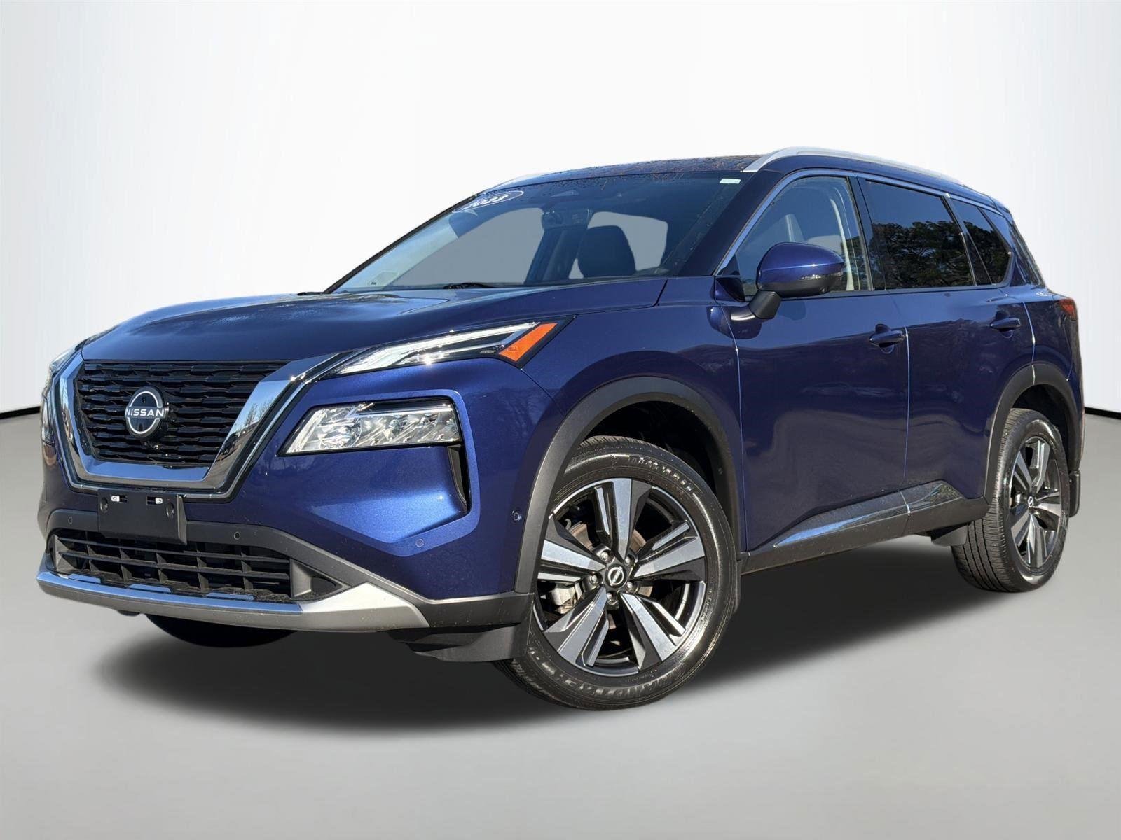 Used 2023 Caspian Blue Metallic Nissan Platinum image 1