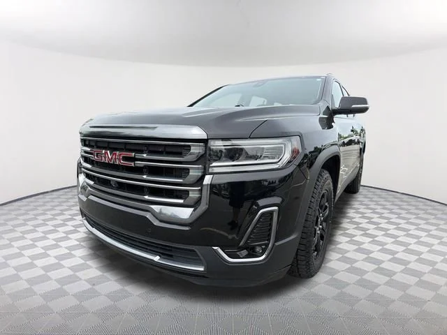 Used 2023 Ebony Twilight Metallic GMC AT4 image 1