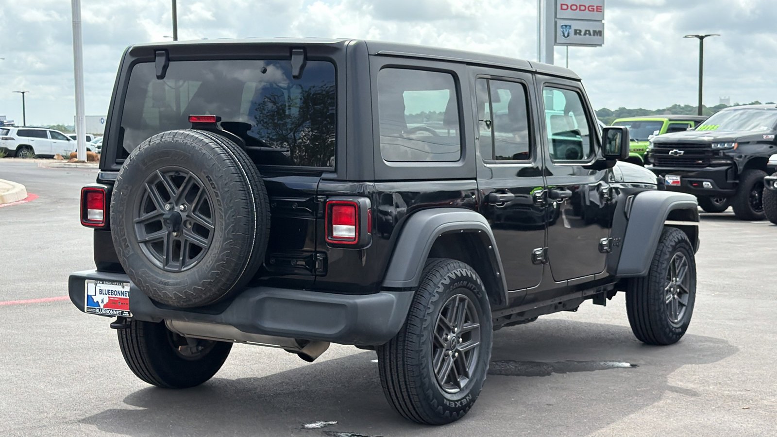 Used 2024 Black Clearcoat Jeep Sport S image 5