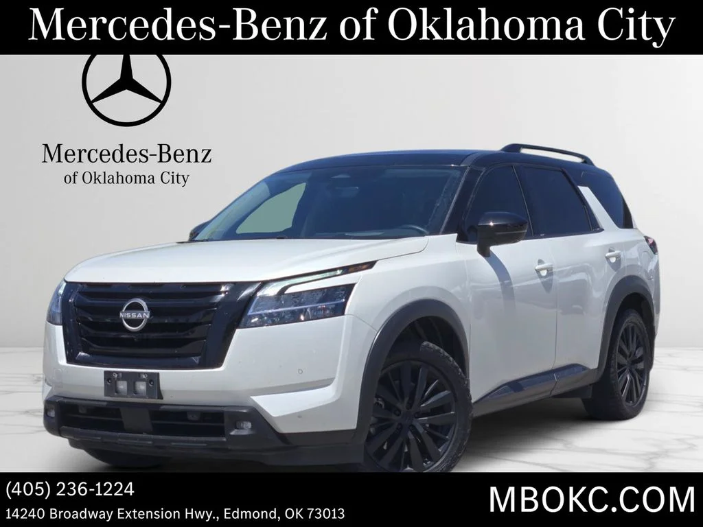 Used 2023 Pearl White Nissan Platinum image 1