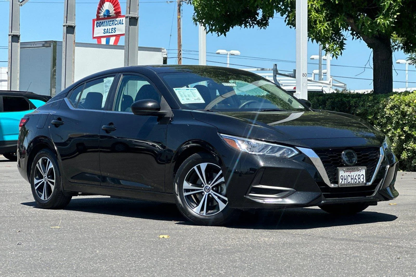 Used 2023 Super Black Nissan SV image 1