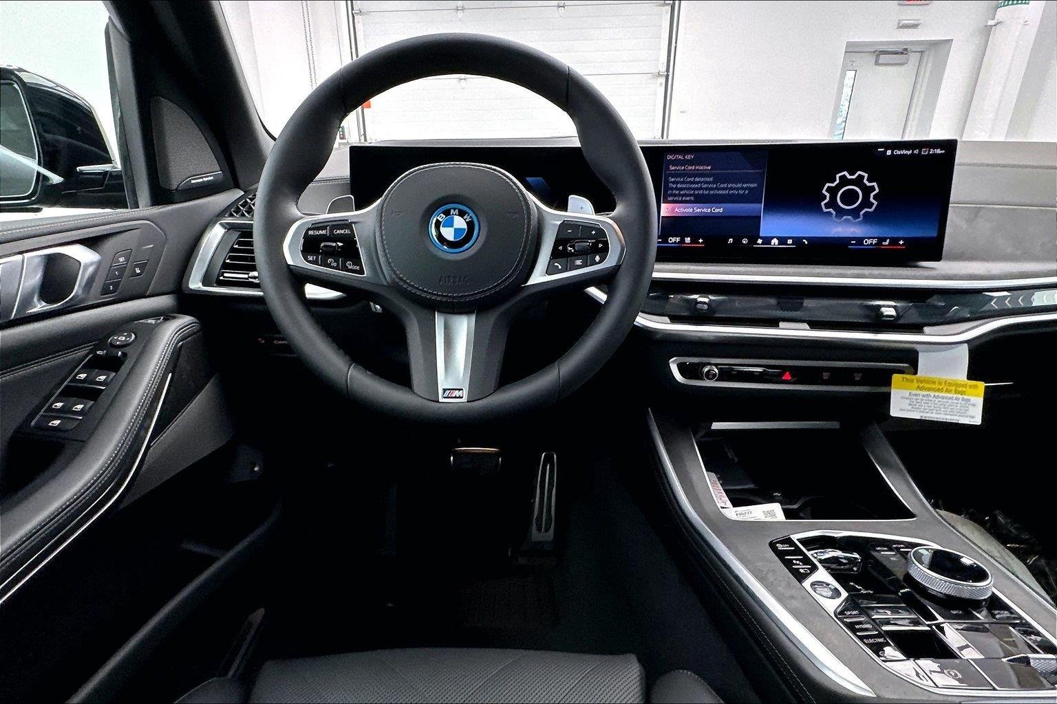 New 2026 Manhattan Green Metallic BMW xDrive50e image 11