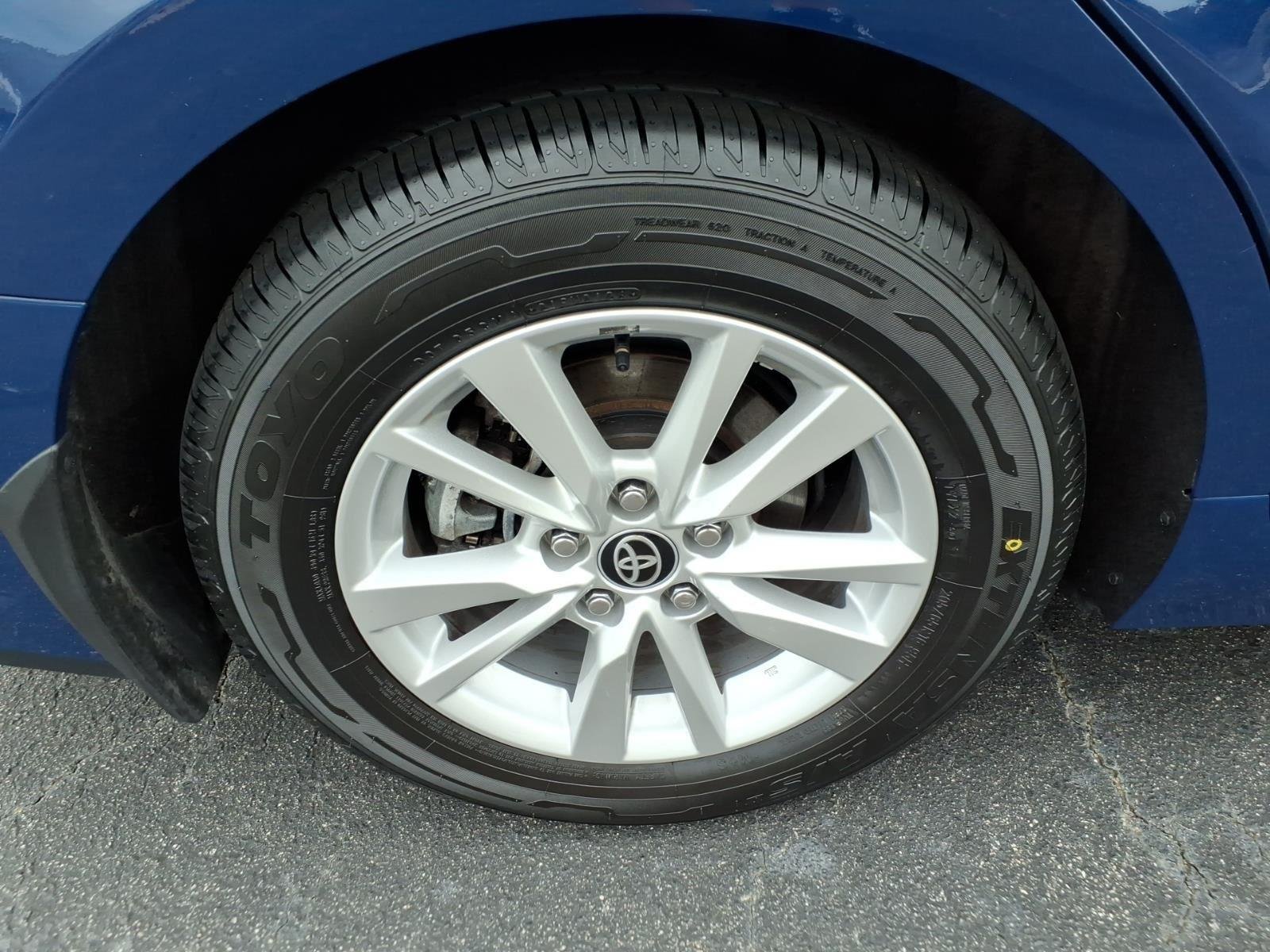 Used 2025 Reservoir Blue Toyota LE image 12