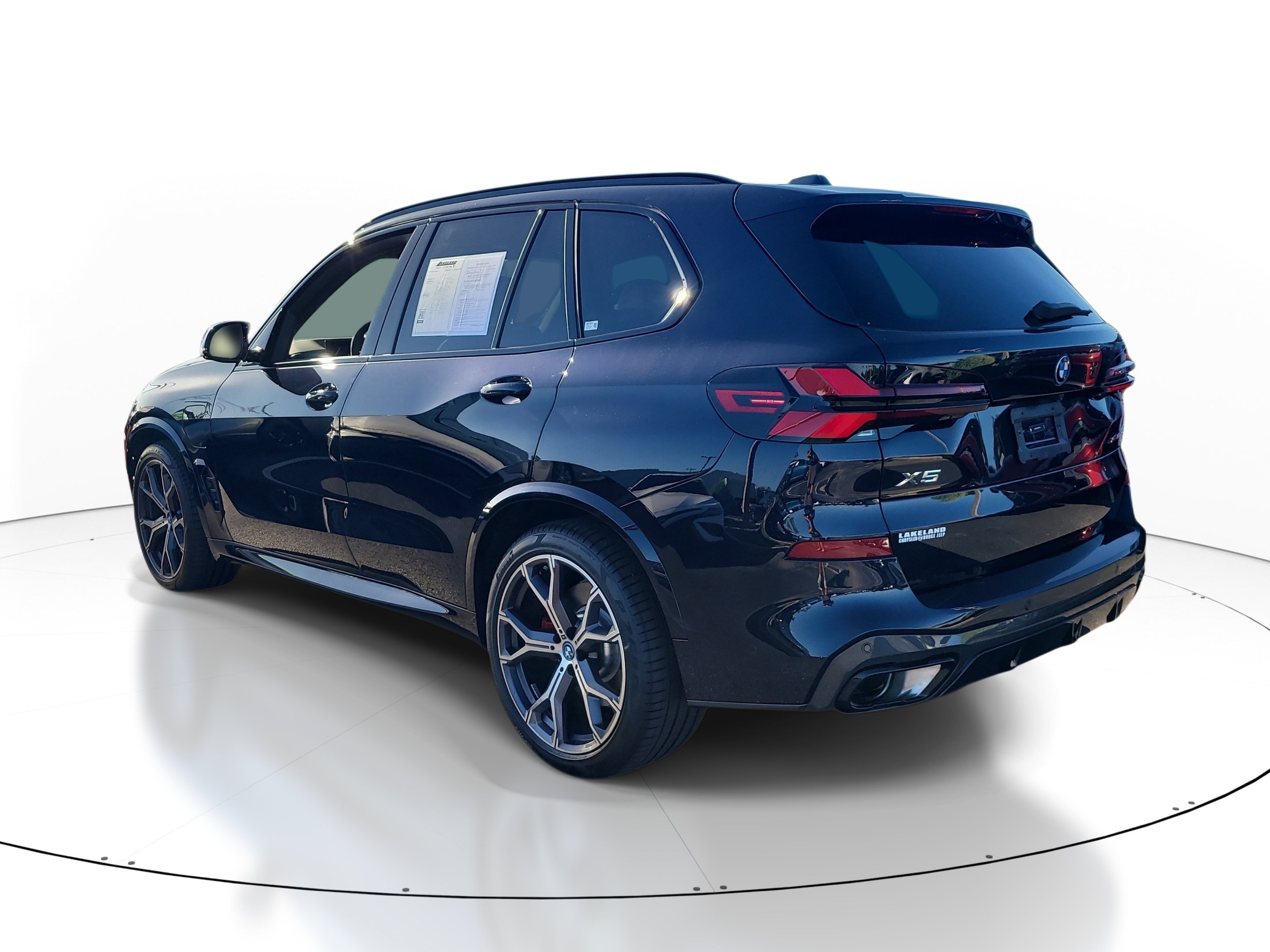 Used 2025 Carbon Black Metallic BMW xDrive50e image 6