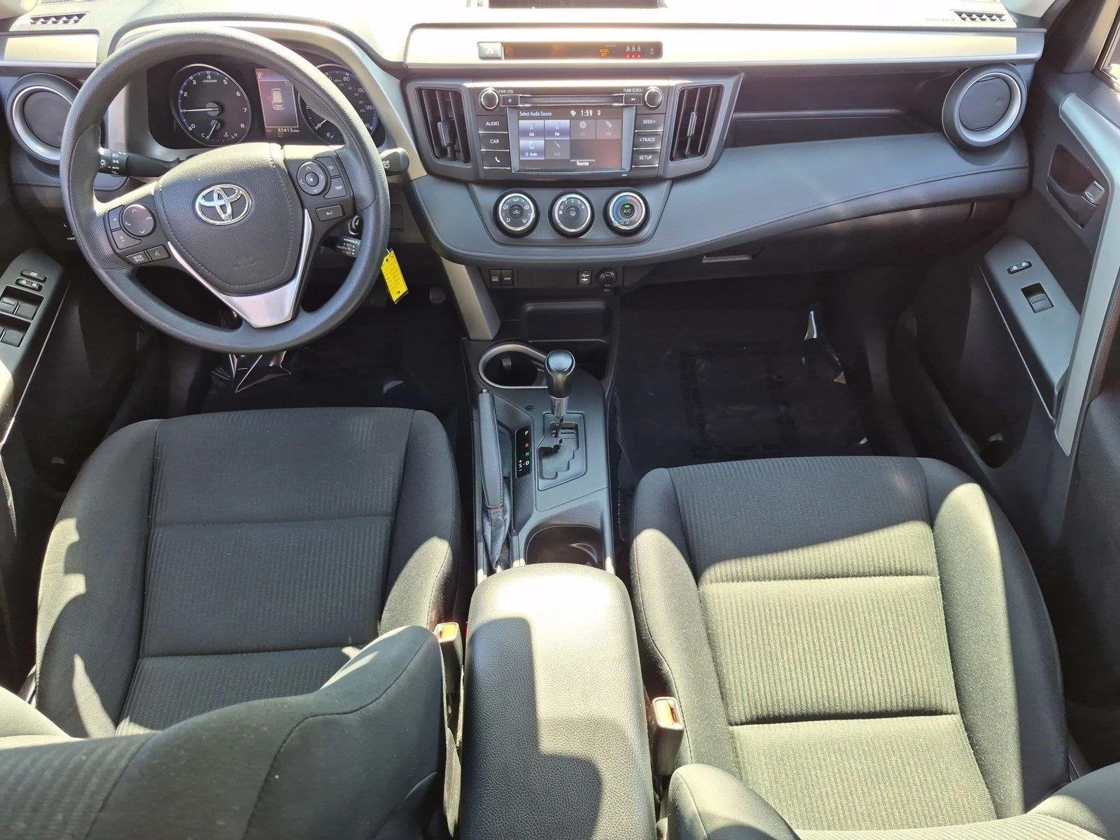 Used 2017 Barcelona Red Metallic Toyota LE image 16