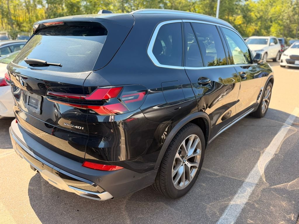 Certified Used 2024 Black Sapphire Metallic BMW xDrive40i image 4