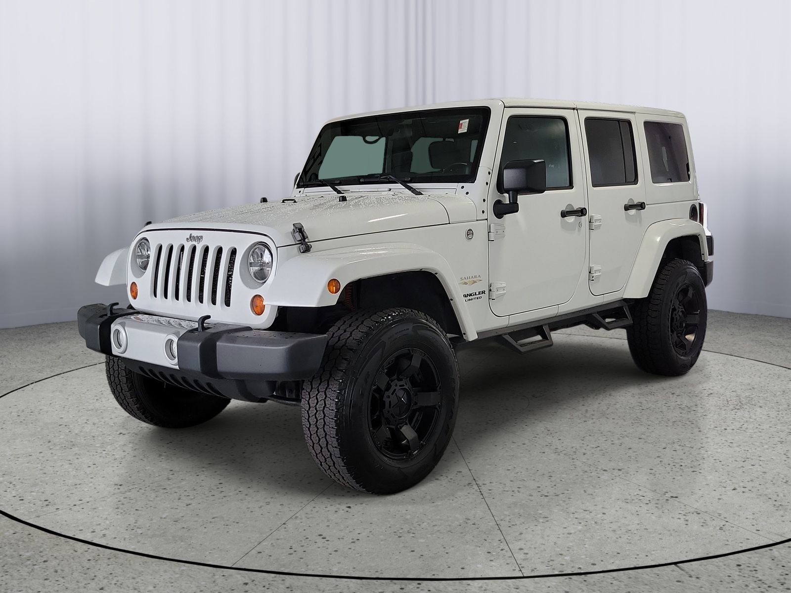 Used 2012 White Jeep Unlimited Sahara image 4