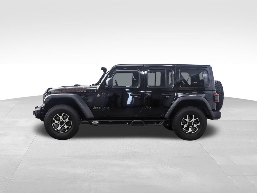 Used 2021 Jeep Wrangler Unlimited Rubicon with VIN 1C4HJXFN2MW557619 for sale in Minneapolis, Minnesota