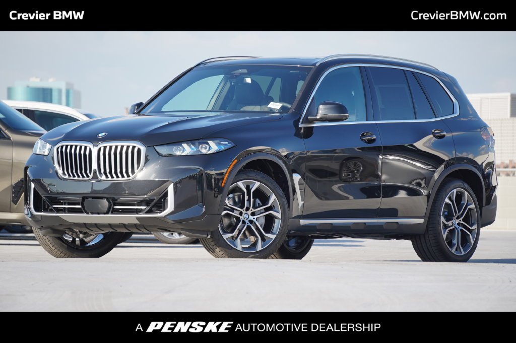 Used 2026 Black Sapphire Metallic BMW sDrive40i image 1