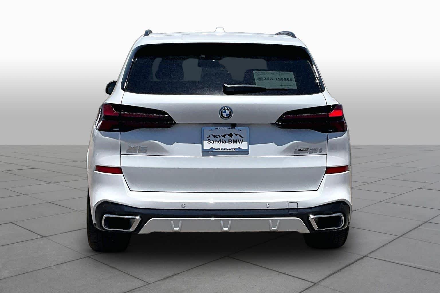 New 2026 Mineral White Metallic BMW xDrive50e image 4