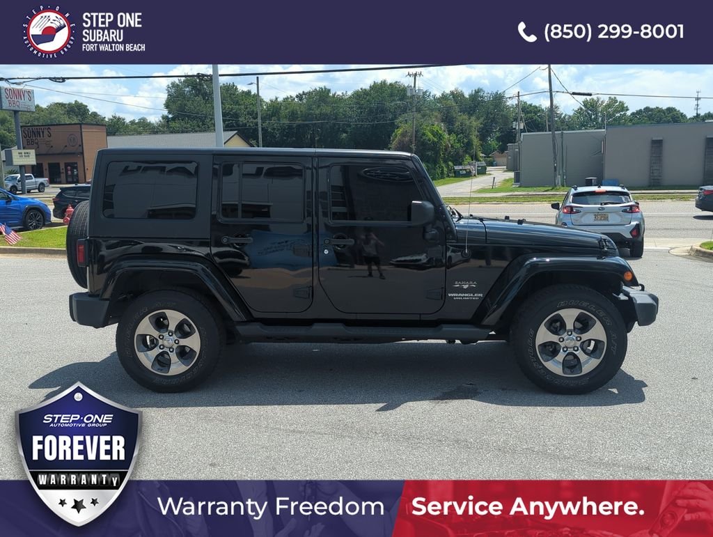 Used 2017 Black Jeep Unlimited Sahara image 8