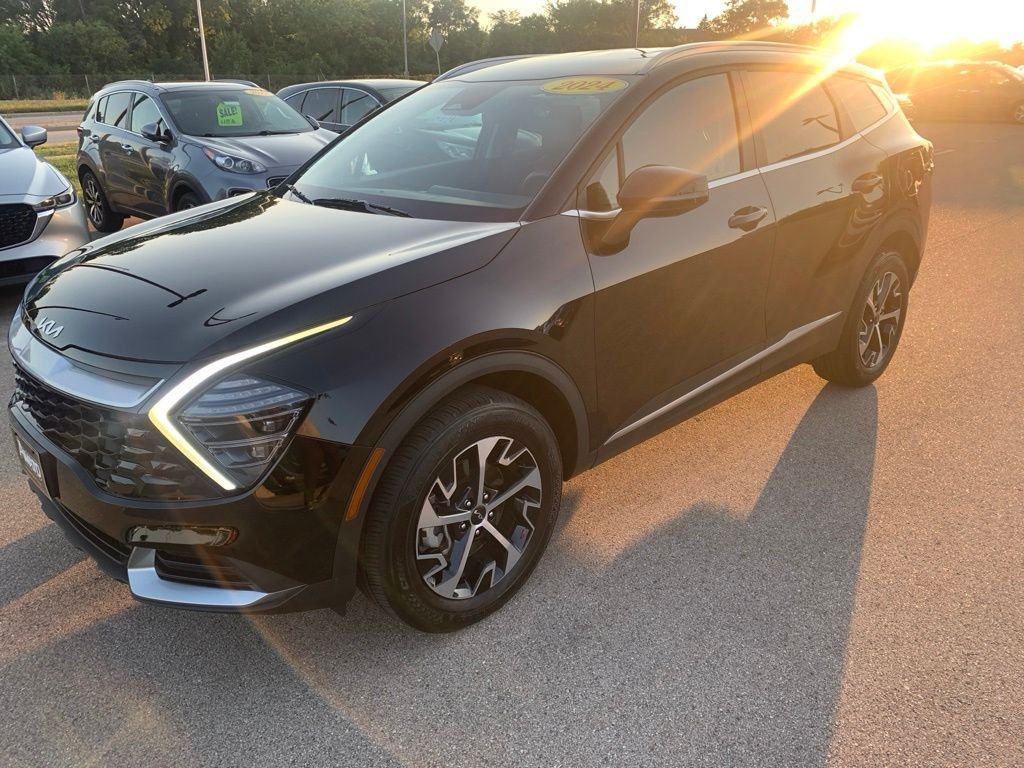 Used 2024 Black Kia EX image 1