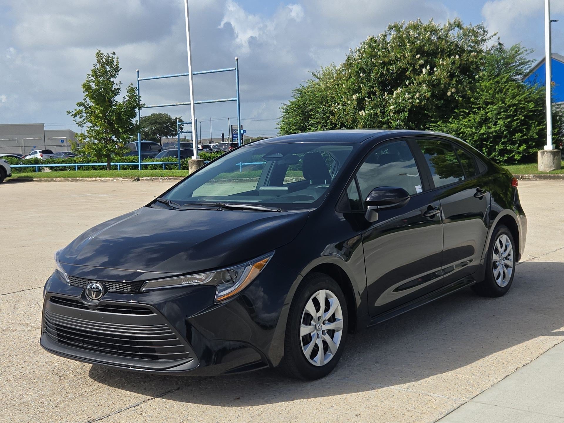 Used 2025 Midnight Black Metallic Toyota LE image 7