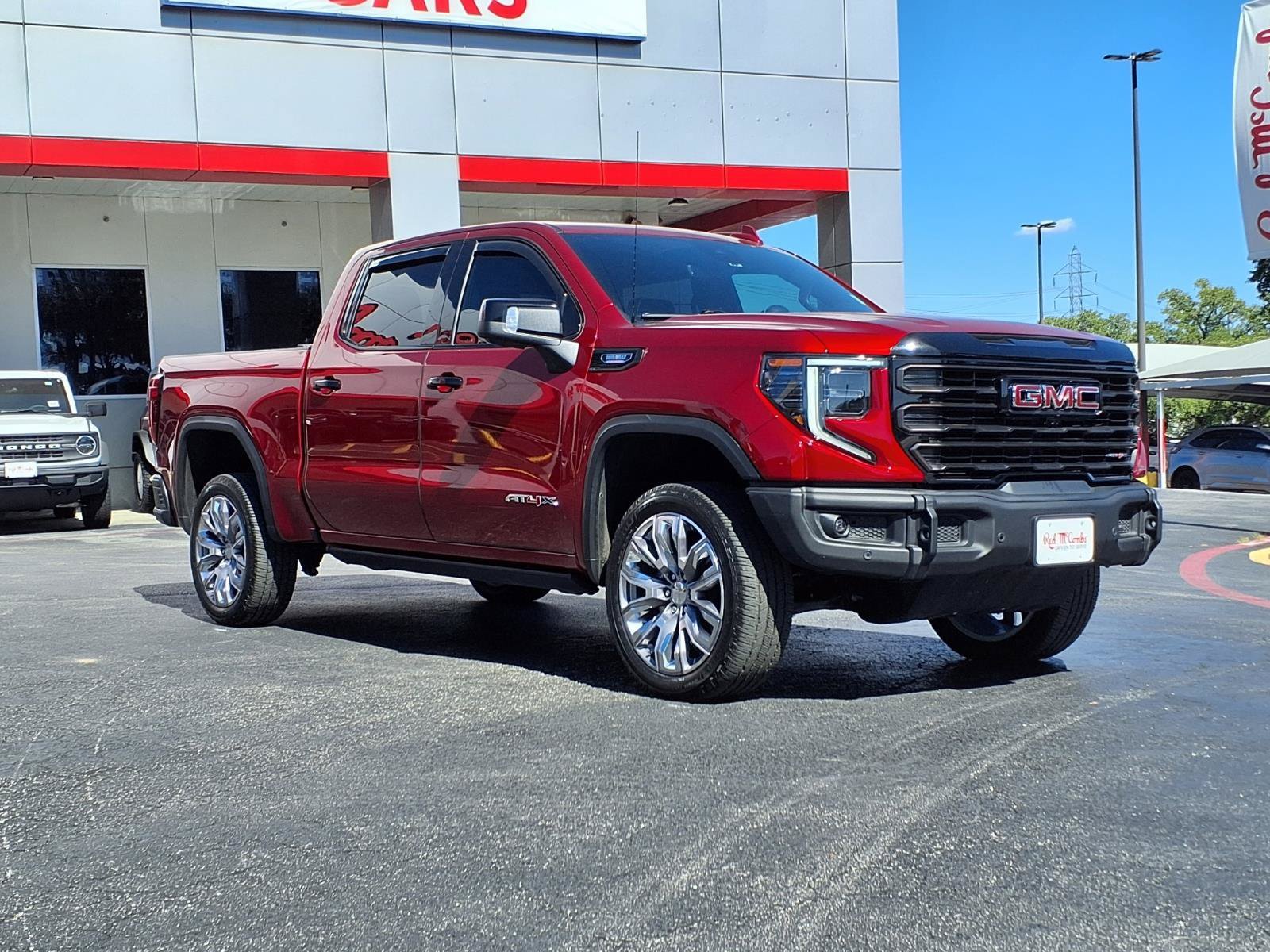 Used 2024 Volcanic Red Tintcoat GMC AT4X image 3