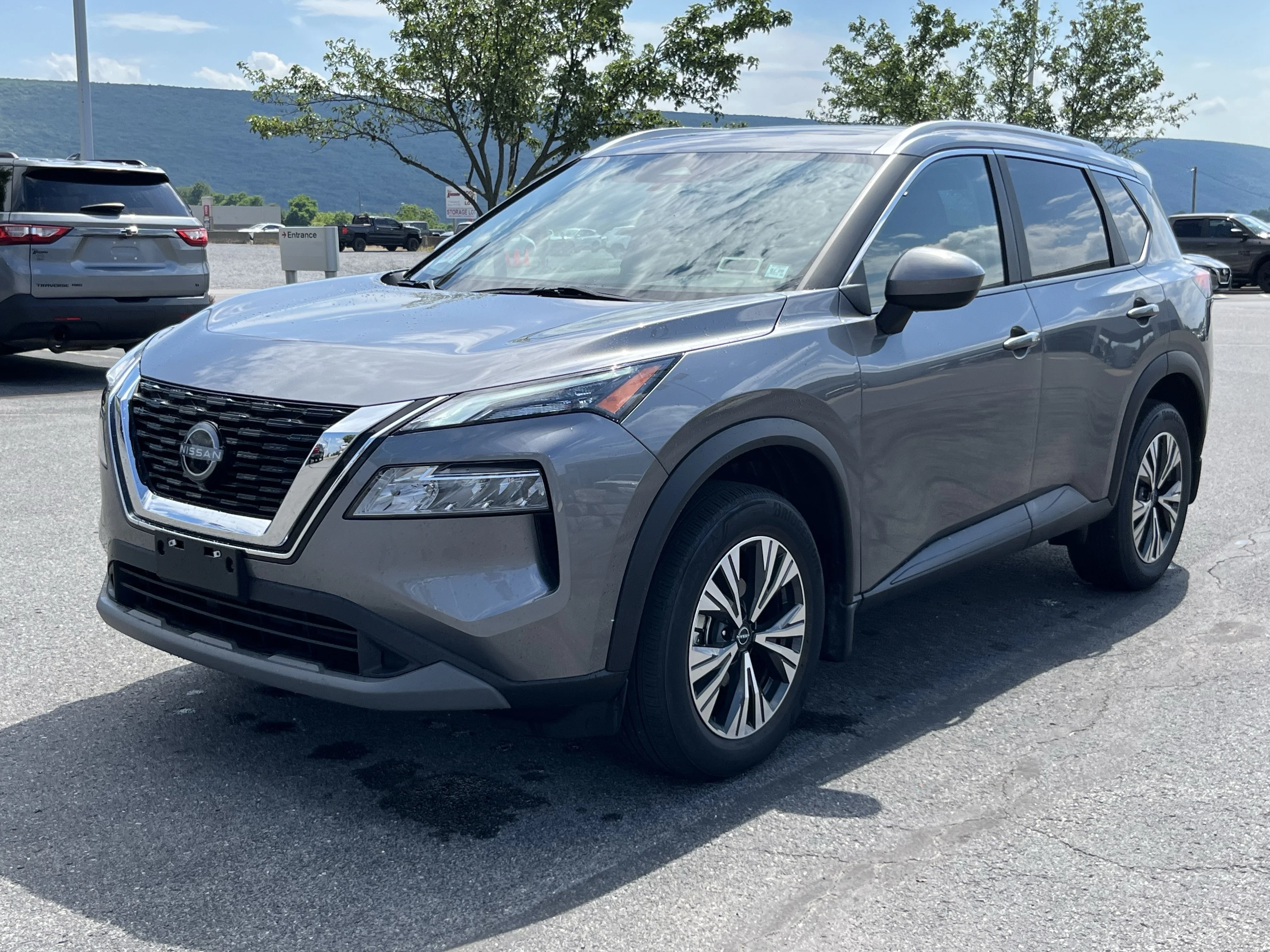 Used 2023 Gun Metallic Nissan SV image 11