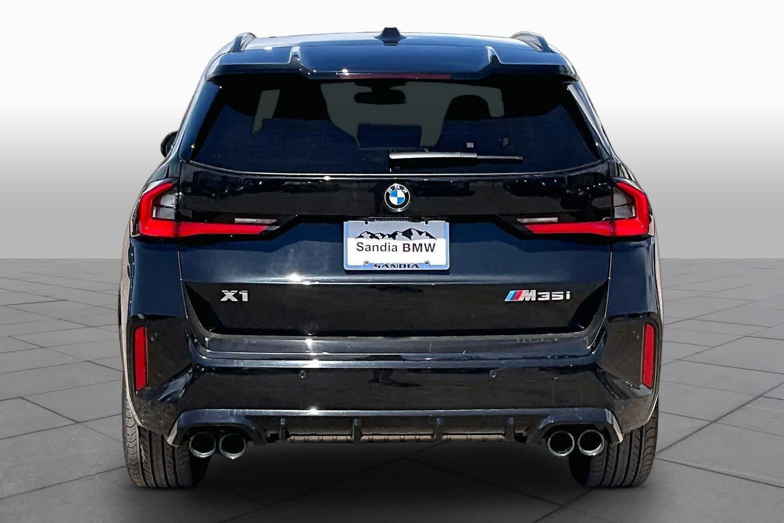 Certified Used 2024 Black Sapphire Metallic BMW M35i image 4