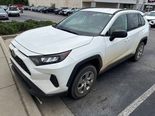Used 2021 White Toyota LE image 1