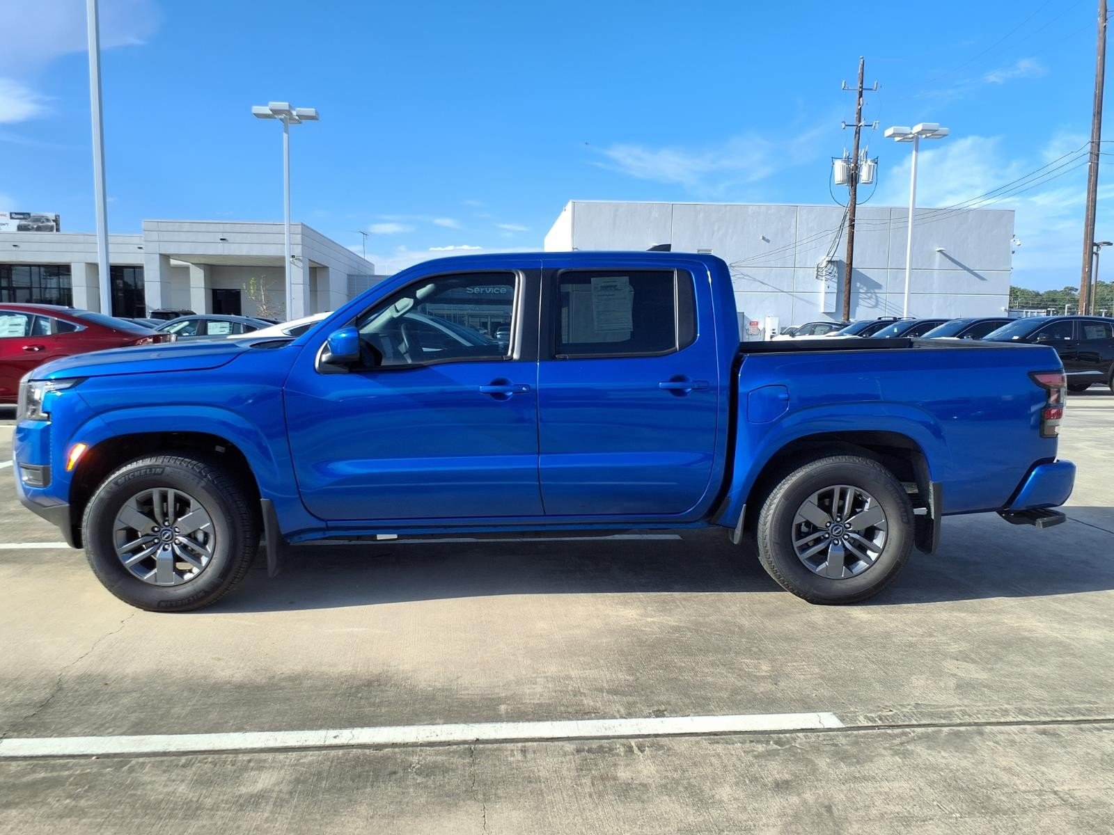 2026 Nissan Frontier SV Blue at Robbins Nissan