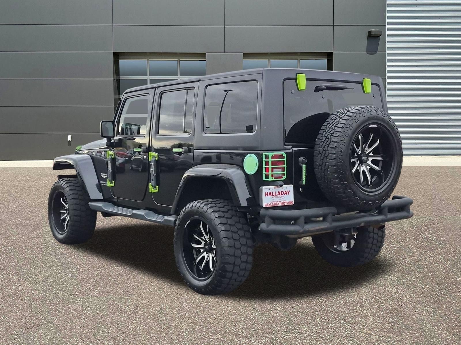 Used 2015 Black Clearcoat Jeep Sahara image 8