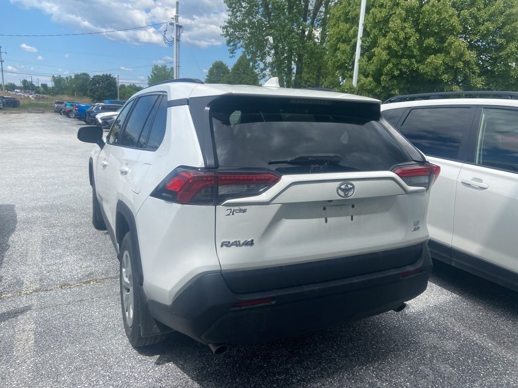 Used 2021 Super White Toyota LE image 4
