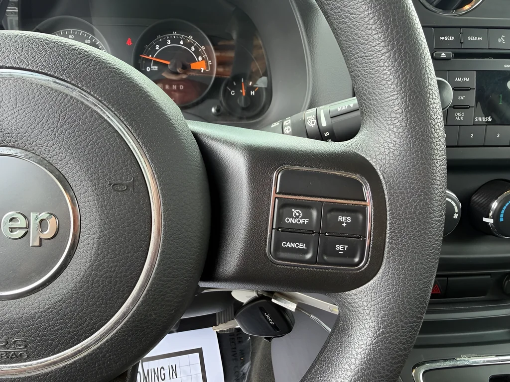 Used 2016 Silver Jeep Sport image 12