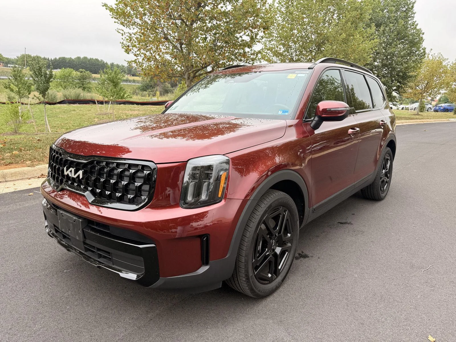 Used 2024 Dawning Red Kia EX X-Line image 2