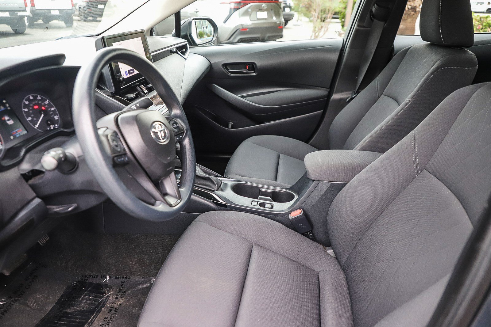 Used 2024 Underground/Midnight Black Metallic Toyota LE image 16